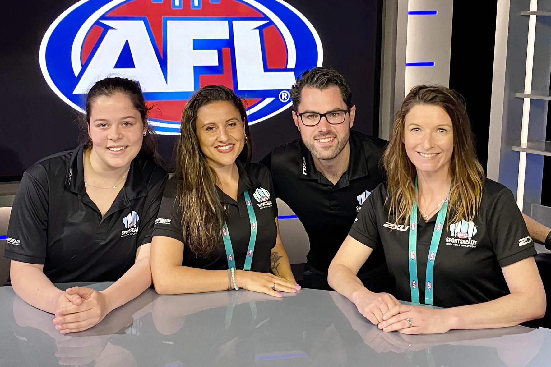 Trainee Eliza visit AFL House with Team